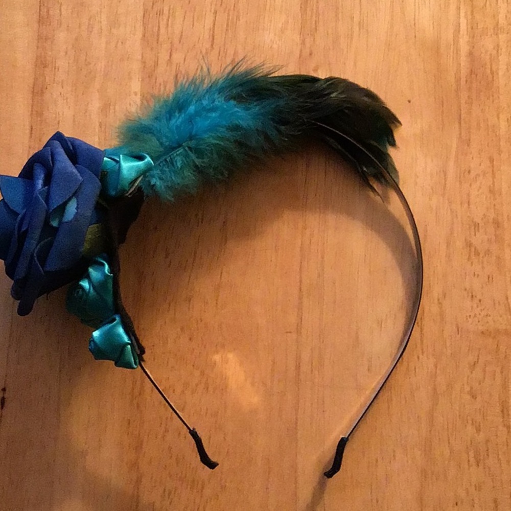 Brand new headband with blue rose and feathers